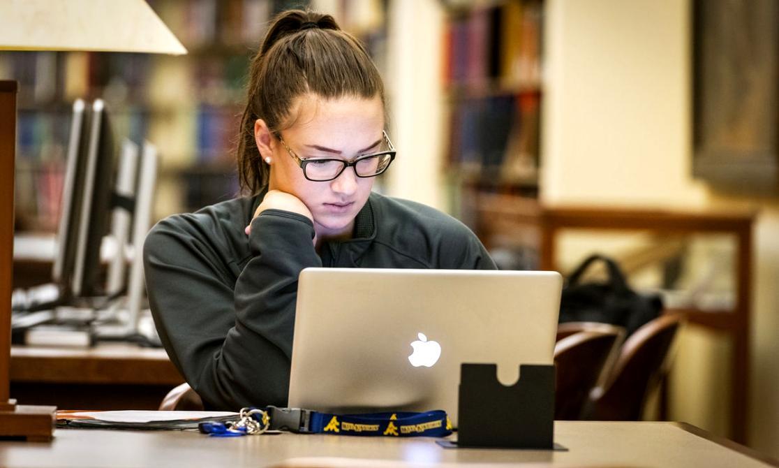 Financial professionals collaborating on budget strategies and client solutions